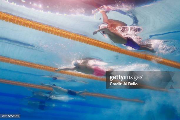 Aleksandr Krasnykh of Russia, Yang Sun of China and Mikhail Dovgalyuk of Russia competes during the Men's 200m Freestyle Semi-finals on day eleven of...