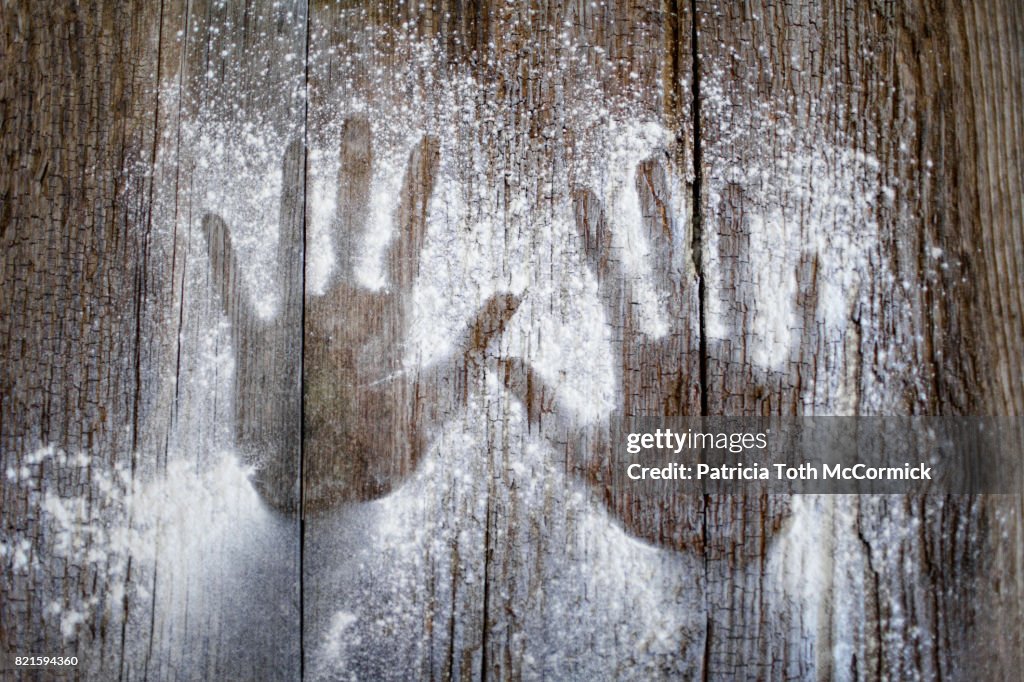 Inverted Hand Prints on Wood
