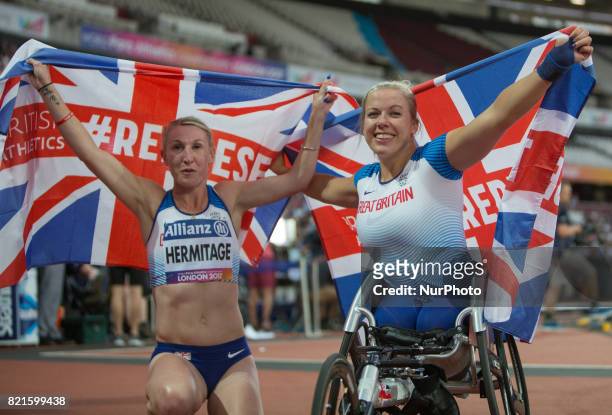 Hannah Cockroft of Great Britain celebrates after winning gold in the Women's 400m T34 Final alongside Georgina Hermitage who won gold in the Women's...