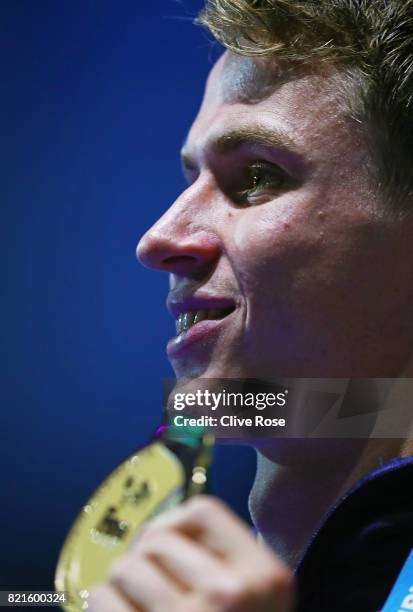 Benjamin Proud of Great Britain celebrates winning gold in the Men's 50m Butterfly Final on day eleven of the Budapest 2017 FINA World Championships...