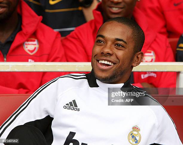 Real Madrid's footballer Robinho on the bench against SV Hamburg during the Emirates Cup competition at the Emirates stadium in north London, on...