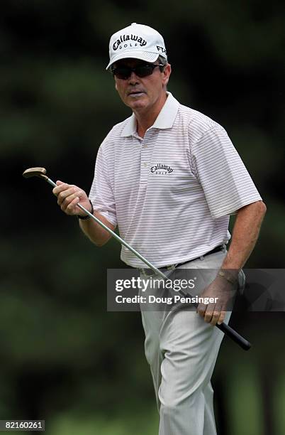 Mark McNulty of Ireland reacts after he putts for birdie on the first hole during the third round of the 2008 U.S. Senior Open Championship at the...