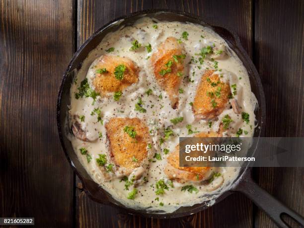 pan fried chicken in cream mushroom sauce - roast chicken gravy stock pictures, royalty-free photos & images