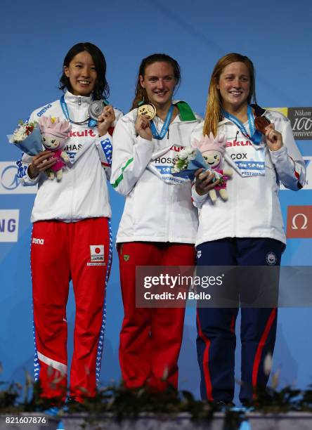 Silver medalist Yui Ohashi of Japan gold medalist Katinka Hosszu of Hungary and bronze medalist Madisyn Cox of the United States celebrate their...
