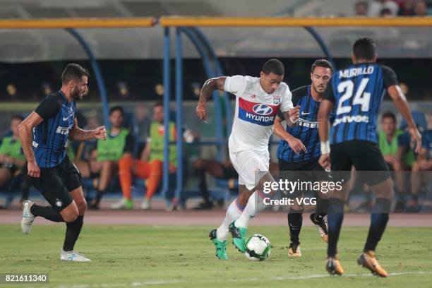 Danilo D'Ambrosio of FC Internazionale and Memphis Depay of Lyon compete for the ball during the 2017 International Champions Cup match between FC...