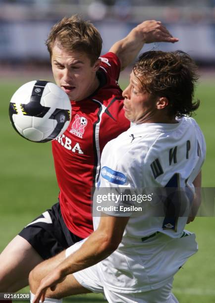 Radek Shirl of FC Zenit, St.Petersburg competes for the ball with Vitali Kaleshin of FC Moscow, a.k.a. FC Moskva, Moscow during the Russian Football...
