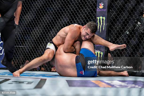 On Fox 25: Chris Weidman in action vs Kelvin Gastelum during middleweight bout at Nassau Coliseum. Uniondale, NY 7/22/2017 CREDIT: Chad Matthew...