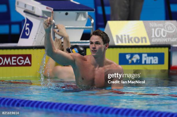 Benjamin Proud of Great Britain celebrates winning the final of Men's 50m Butterfly on day eleven of the FINA World Championships at the Duna Arena...