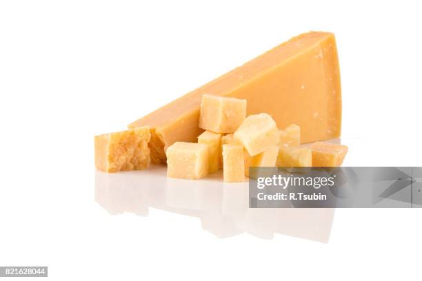 hard cheese on white - parmigiano foto e immagini stock