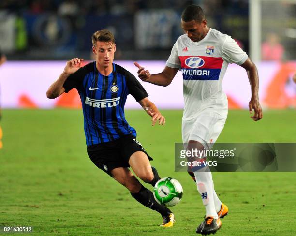 Andrea Pinamonti of FC Internazionale and Marcelo Antonio Guedes Filho of Lyon compete for the ball during the 2017 International Champions Cup match...