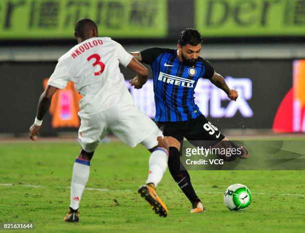 Gabriel Barbosa Almeida of FC Internazionale and Nicolas Nkoulou of Lyon compete for the ball during the 2017 International Champions Cup match...