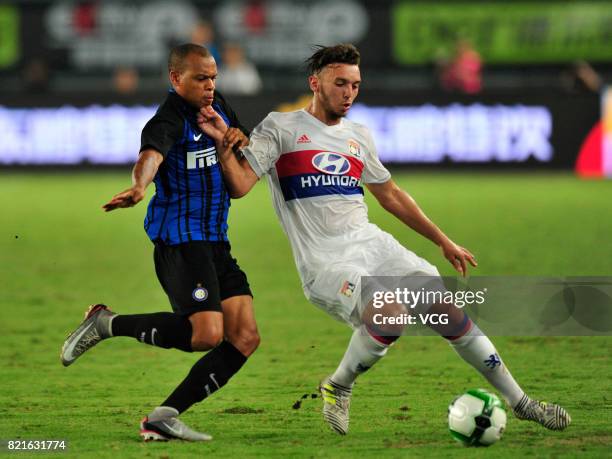 Jonathan Biabiany of FC Internazionale and Amine Gouiri of Lyon compete for the ball during the 2017 International Champions Cup match between FC...