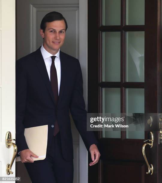 White House Senior Advisor and President Donald Trump's son-in-law Jared Kushner walks out of the West Wing of the White House to read a statement...