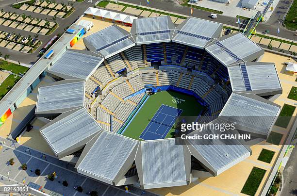 This aerial photos shows the tennis stadium for the Beijing 2008 Olympic Games in the Chinese capital on August 3, 2008. Beijing basked under another...
