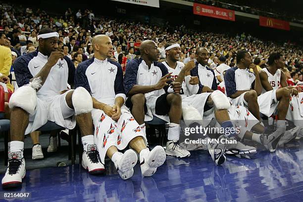 LeBron James, Jason Kidd, Dwyane Wade, Carmelo Anthony and Kobe Bryant of the USA Basketball Men's Senior National Team talk during the USA...