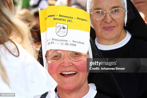 Nuns wait for the Angelus prayer with Pope Benedict XVI in front of Brixen Cathedral on August 3, 2008 in Brixen, Italy. Pope Benedict spends his...