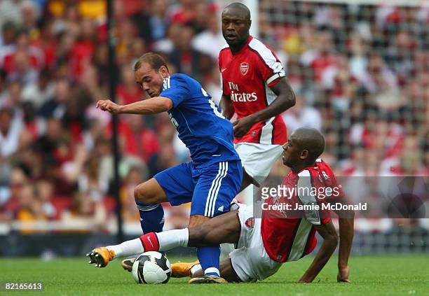 Wesley Sneijder of Real Madrid battles for the ball with Abou Diaby of Arsenal during the pre-season friendly match between Arsenal and Real Madrid...