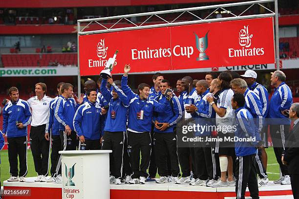 Hamburg players hold the trophy after they won the Emirates Cup at the Emirates Stadium on August 3, 2008 in London, England.