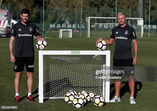 Fabricio Agosto Ramirez and Andreas Beck of Besiktas pose for a photo before a training session of the team in Marbella, Spain on July 24, 2017.