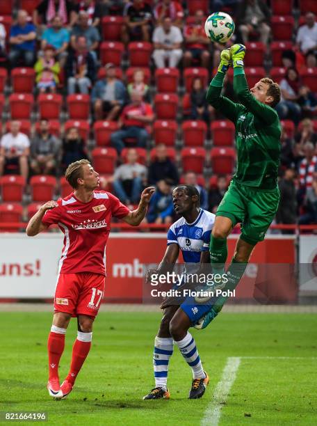 Left: Simon Hedlund of 1 FC Union Berlin and right: Alex Smithies of the Queens Park Rangers during the game between Union Berlin and the Queens Park...