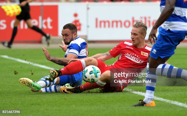 Joel Lynch of the Queenspark Rangers and Sebastian Polter of 1.FC Union Berlin during the game between Union Berlin and the Queens Park Rangers on...