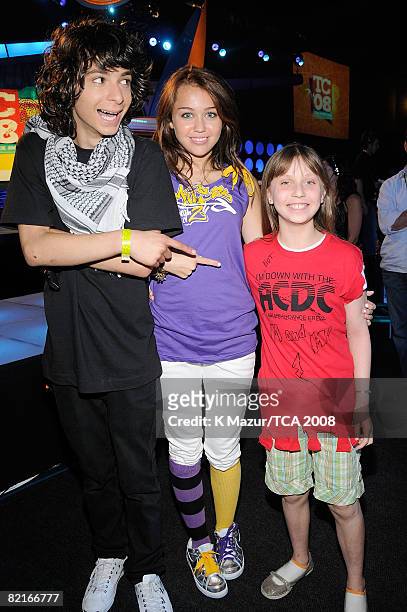 Dancer Adam G. Sevani and host Miley Cyrus during the 2008 Teen Choice Awards at Gibson Amphitheater on August 3, 2008 in Los Angeles, California.