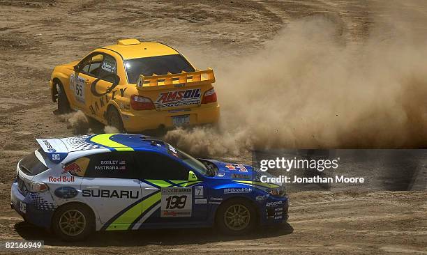Drivers Mikael Johansson and Kyle Sarasin compete against Travis Pastrana and Carolyn Bosley during the Rally Car Racing Final at during X Games 14...