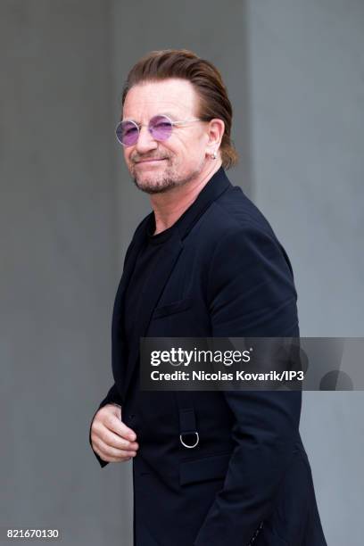 Bono, singer of U2 and cofounder of the NGO One, arrives to meet French President Emmanuel Macron at the Elysee Palace on July 24, 2017 in Paris,...