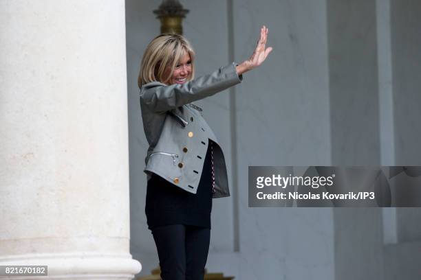 Brigitte Trogneux, Emmanuel Macron's wife, welcomes Bono , singer of U2 and cofounder of the NGO One, as he arrives to meet French President at the...