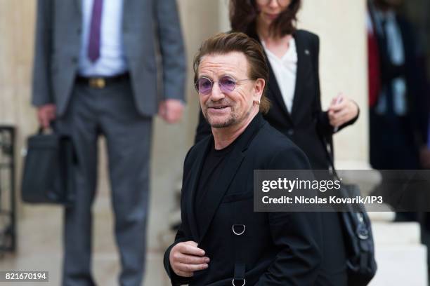 Bono , singer of U2 and cofounder of the NGO One, arrives to meet French President Emmanuel Macron at the Elysee Palace on July 24, 2017 in Paris,...