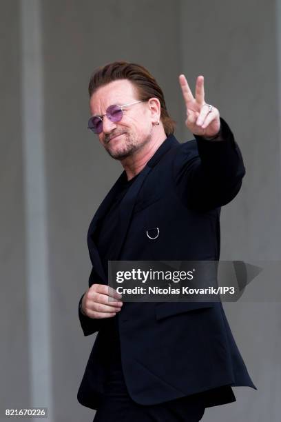 Bono, singer of U2 and cofounder of the NGO One, arrives to meet French President Emmanuel Macron at the Elysee Palace on July 24, 2017 in Paris,...