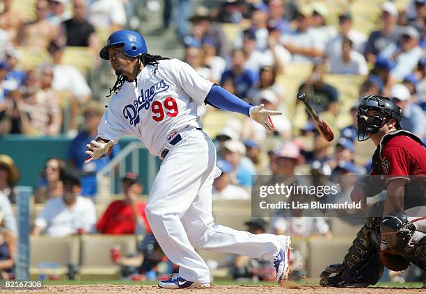 Manny Ramirez of the Los Angeles Dodgers hits a home run in the fifth inning against the Arizona Diamondbacks at Dodger Stadium on August 3, 2008 in...