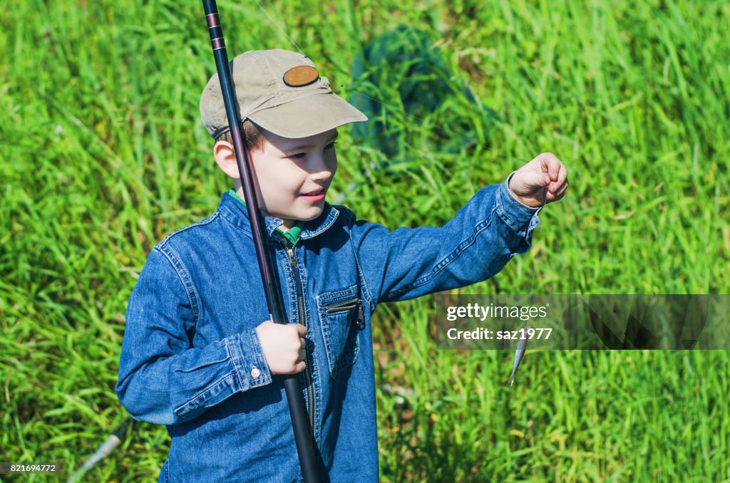 Boy fishing in the summer