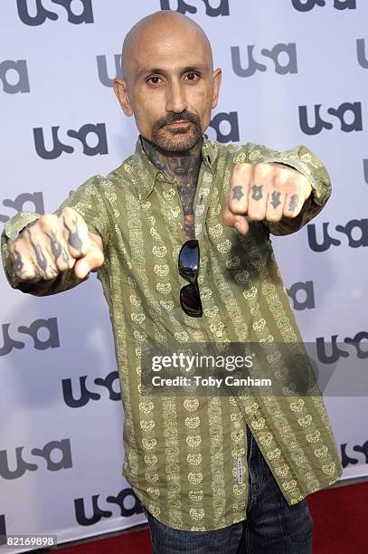 Robert LaSardo poses for a picture at the USA Networks celebration of "Monks" 100th episode held at the Pane e Vino restaurant August 3, 2008 in Los...