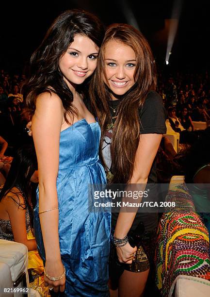 Actress Selena Gomez and host Miley Cyrus during the 2008 Teen Choice Awards at Gibson Amphitheater on August 3, 2008 in Los Angeles, California.