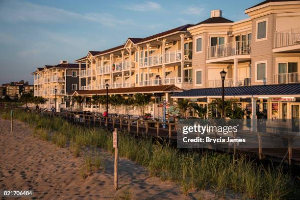bethany beach boardwalk at sunrise - bethany beach stock pictures, royalty-free photos & images