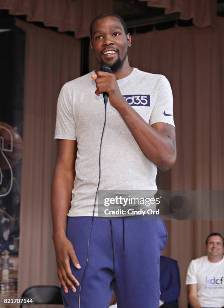 Professional basketball player Kevin Durant speaks to students during the KD Build It and They Will Ball court ceremony on July 24, 2017 in New York...