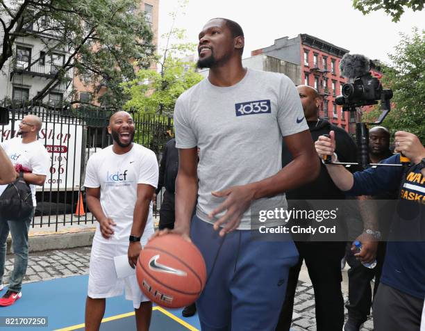 Professional basketball player Kevin Durant enters the basketball court during the KD Build It and They Will Ball court ceremony on July 24, 2017 in...