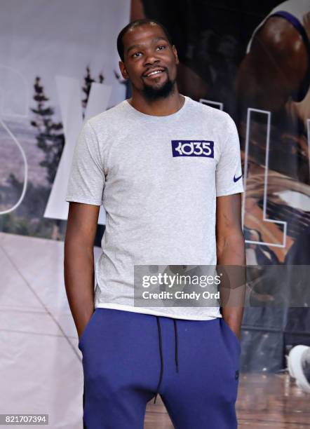 Professional basketball player Kevin Durant speaks to students during the KD Build It and They Will Ball court ceremony on July 24, 2017 in New York...