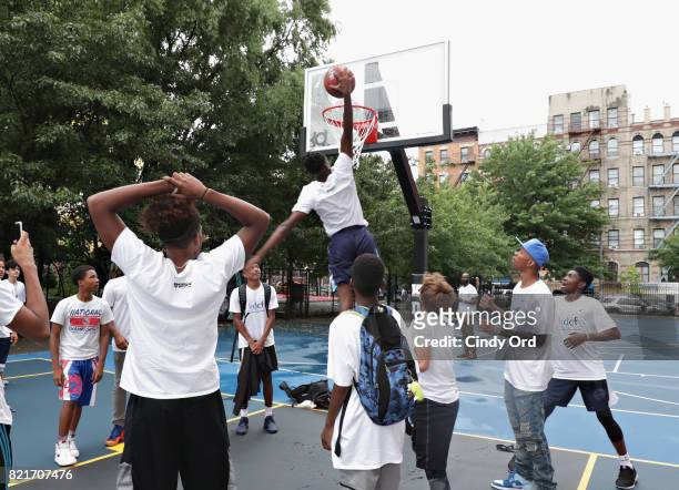 Students enjoy the newly refurbished courts during the KD Build It and They Will Ball court ceremony on July 24, 2017 in New York City.
