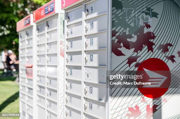 canada post decorative community mailbox seen from the side during summer day - canada post stock pictures, royalty-free photos & images