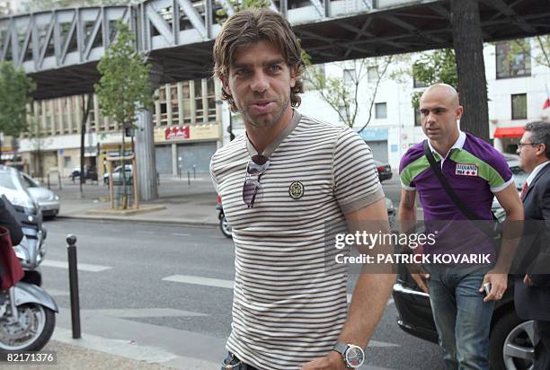 Lyon's L1 football team's player, Juninho Pernambucano and Lyon's captain Cris arrive on August 4, 2008 in Paris at the French Football Federation...