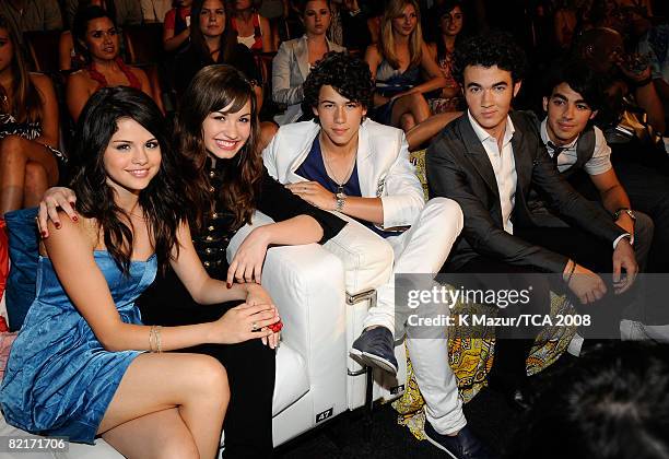 Actress Selena Gomez, singer Demi Lovato and recording artists The Jonas Brothers during the 2008 Teen Choice Awards at Gibson Amphitheater on August...