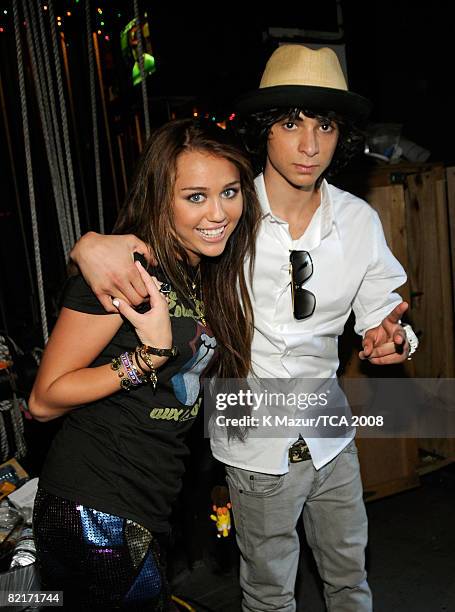 Host Miley Cyrus and dancer Adam Sevani during the 2008 Teen Choice Awards at Gibson Amphitheater on August 3, 2008 in Los Angeles, California.