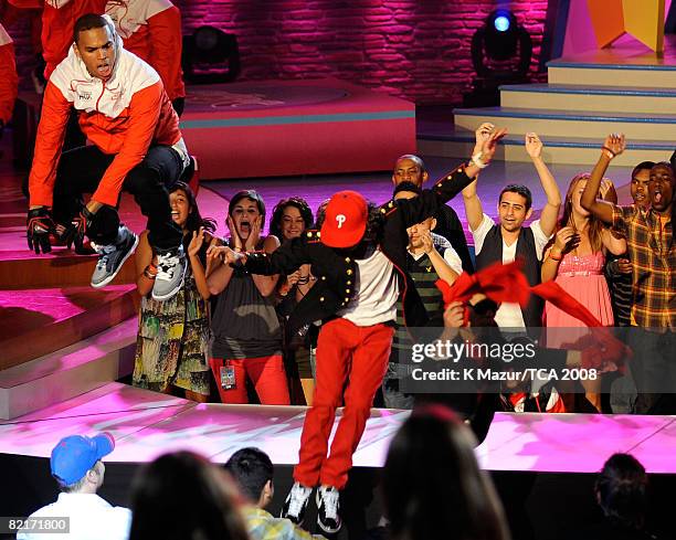 Singer Chris Brown and Adam Sevani performing onstage during the 2008 Teen Choice Awards at Gibson Amphitheater on August 3, 2008 in Los Angeles,...