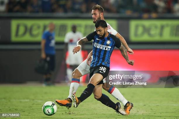 Gabriel Barbosa of FC Internationale competes for the ball with Lucas Tousart of Olympique Lyonnais during the 2017 International Champions Cup China...