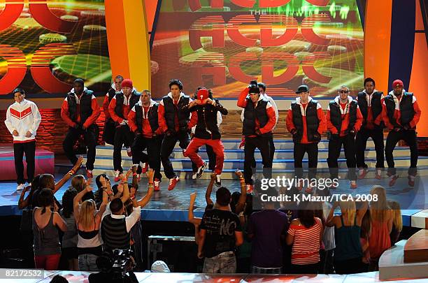 Singer Chris Brown and Adam Sevani with the ACDC dance crew performing onstage during the 2008 Teen Choice Awards at Gibson Amphitheater on August 3,...