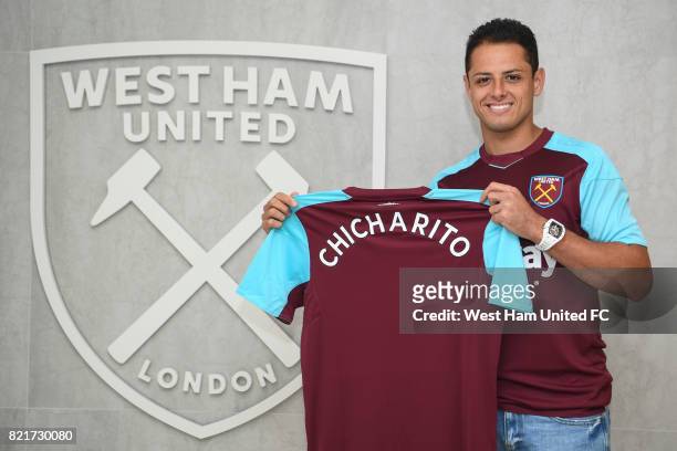Javier Hernandez poses as he is unveiled as a West Ham United player on July 24, 2017 in London, England.