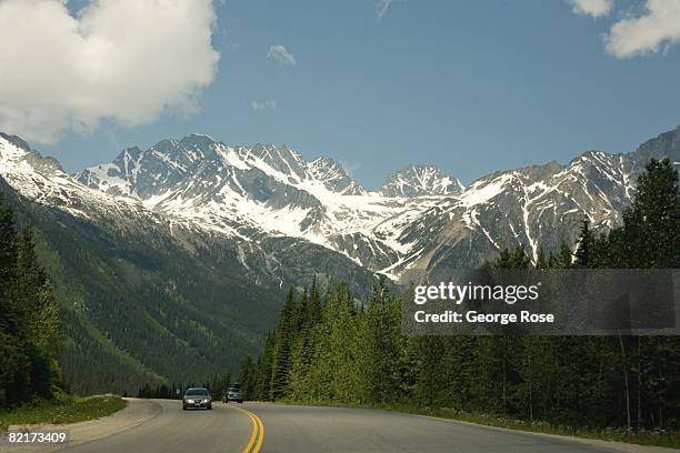 Trans-Canada Hwy 1 crosses the Rockies Mountains in this 2008 Banff Springs, Canada, summer landscape photo.