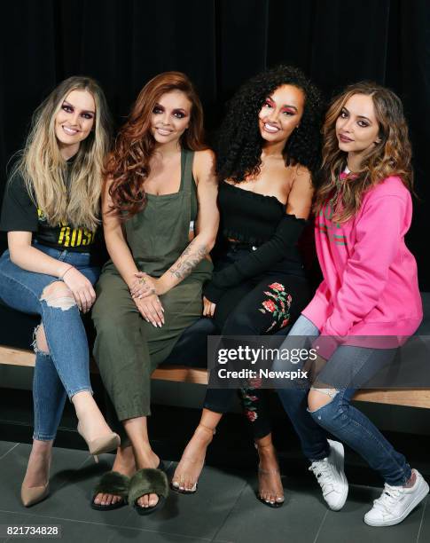 Perrie Edwards, Jesy Nelson, Leigh-Anne Pinnock and Jade Thirlwall of Little Mix pose during a photo shoot at the Margaret Court Arena in Melbourne,...